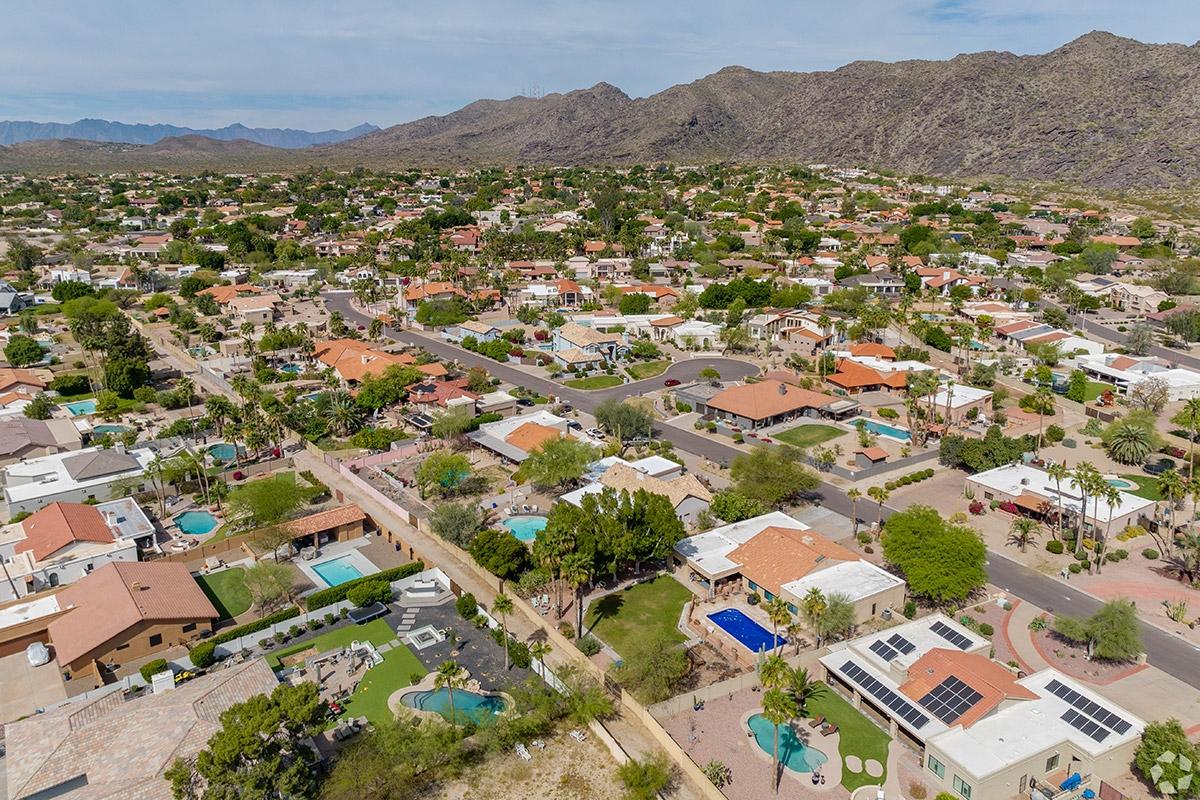 Homes in Ahwatukee back up against a mountain range.