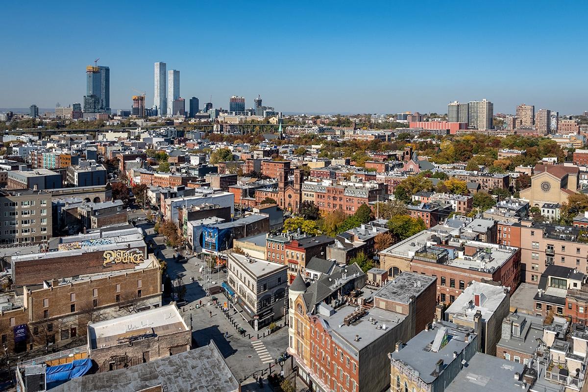 Jersey City contains suburbs and a downtown area.