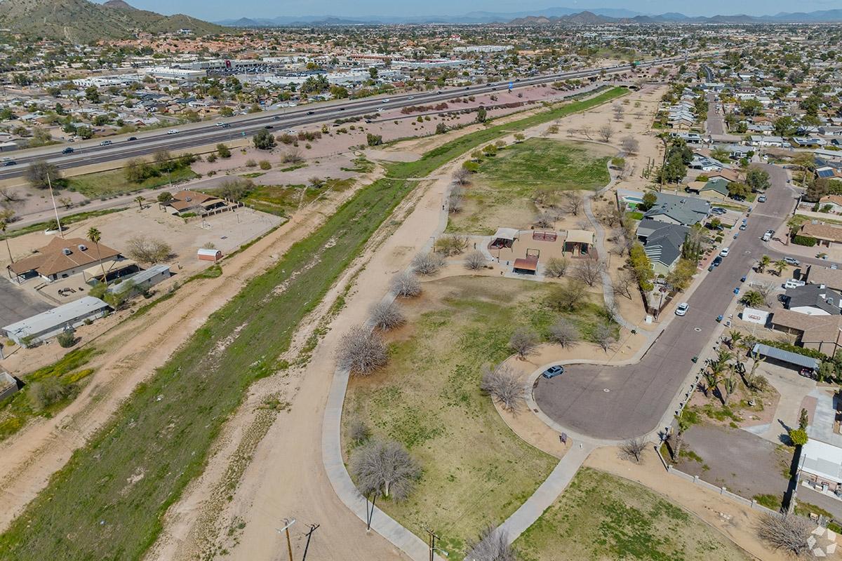 Paradise Valley North has greenery running through it and next to homes.