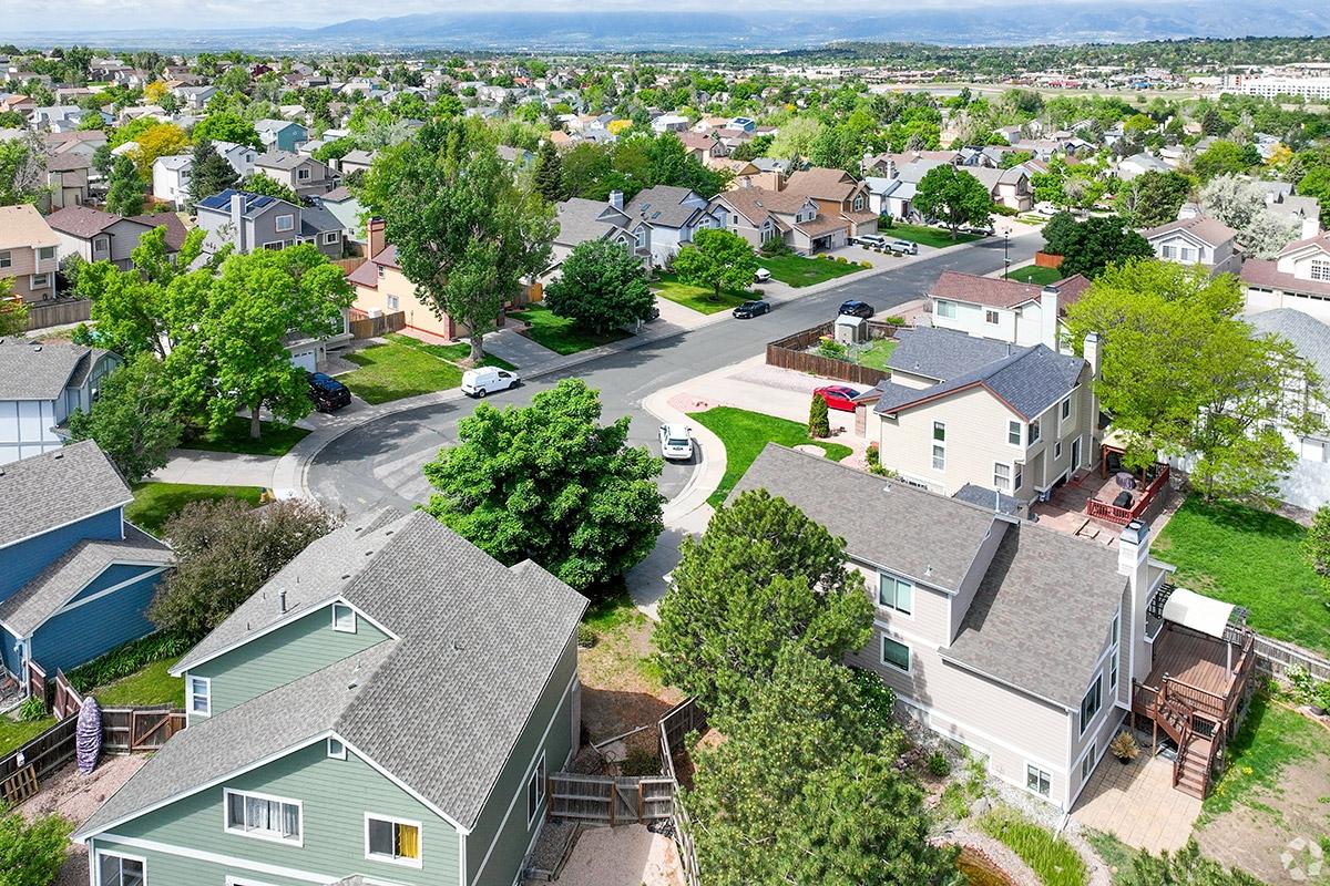 Cimarron Hills is a calm neighborhood where homes are surrounded by trees.