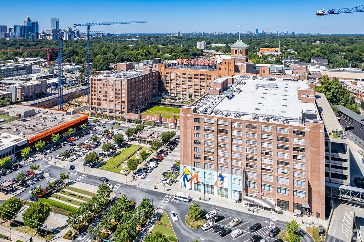 Ponce City Market in Old Fourth Ward with the Downtown Atlanta skyline in the distance.