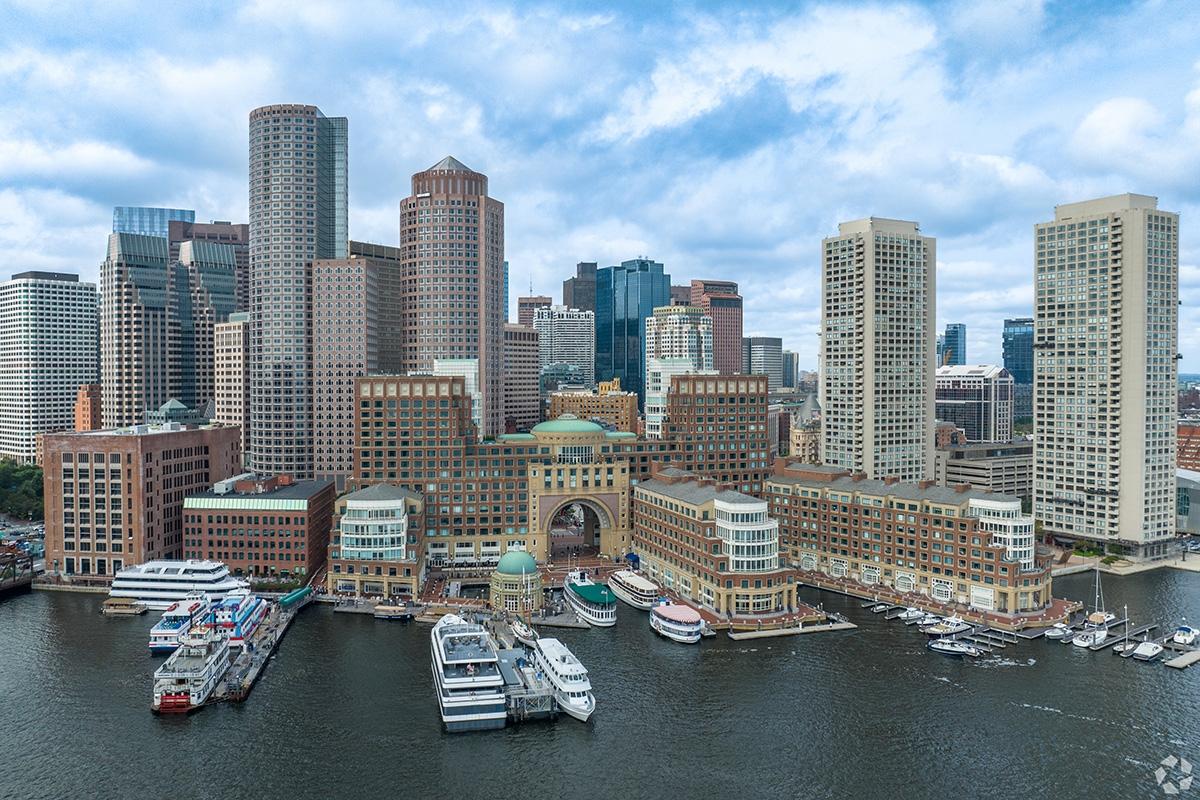 The Boston skyline from over the Boston Harbor.