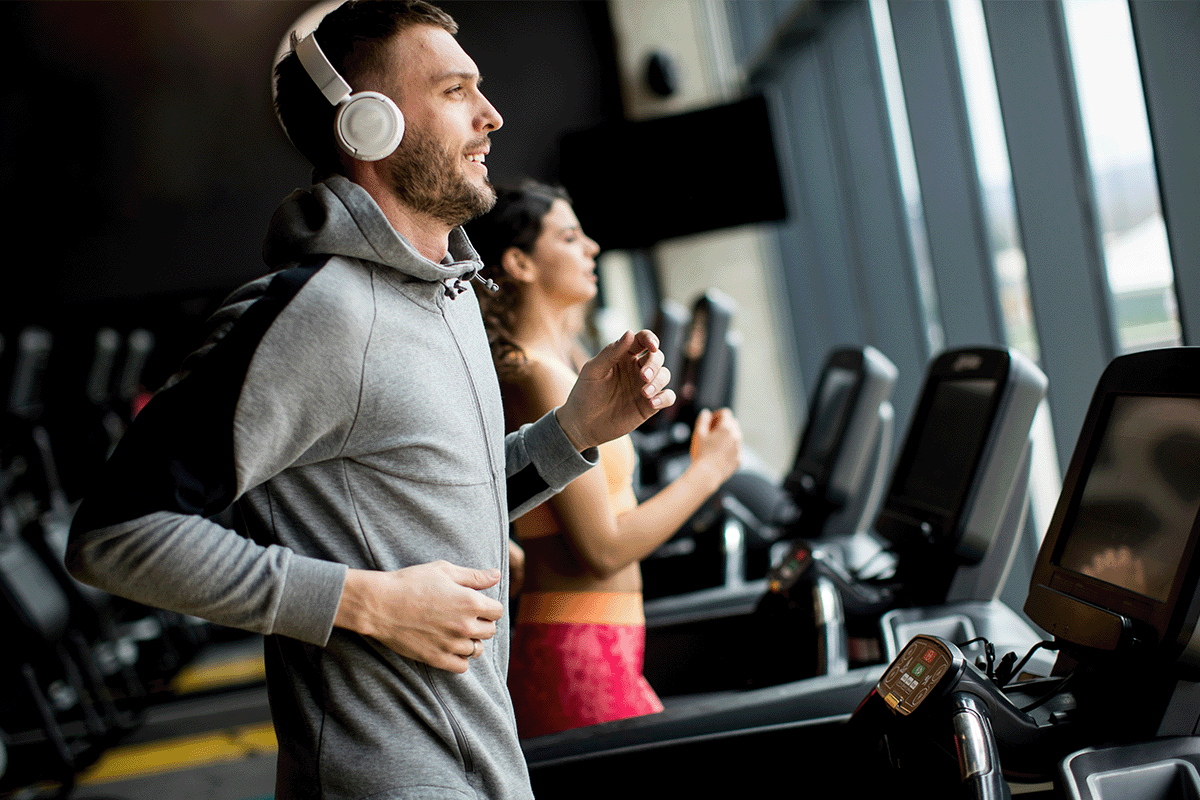 Renters using apartment fitness center gym amenity