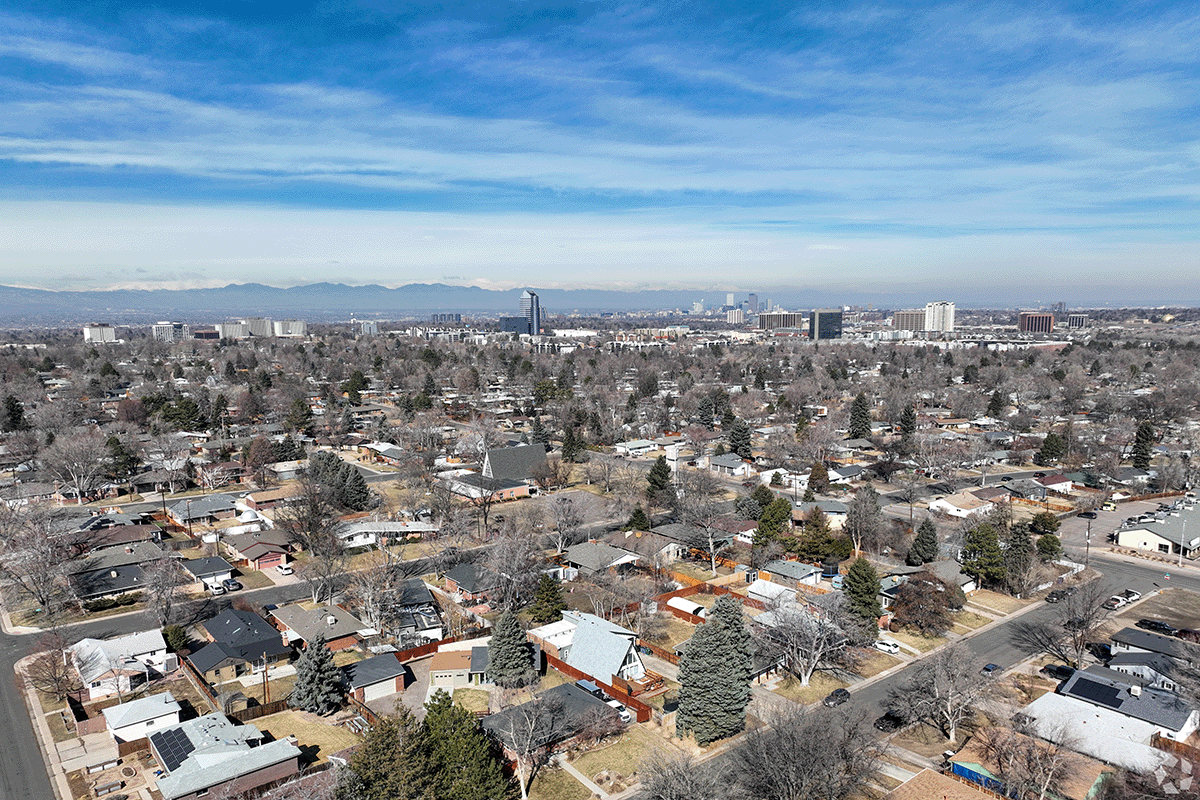 An aerial view of Virginia Village with mountains in the backdrop.