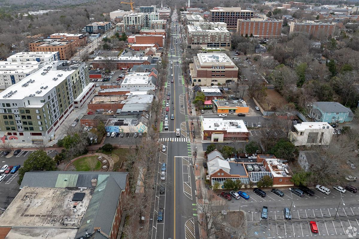 Chapel Hill's main street is lined with local businesses that are surrounded by apartment communities.