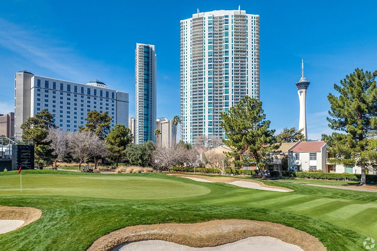 A golf course looks up to high-rise apartment communities in Midtown Las Vegas.