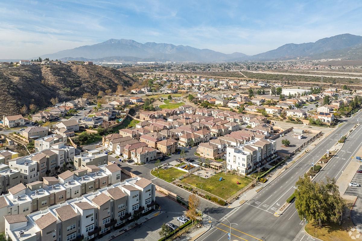 Homes and apartment communities sit next to mountains and canyons in San Bernardino.