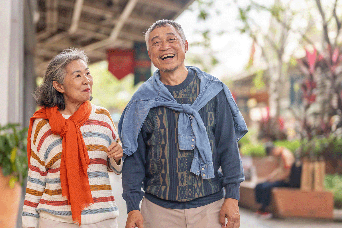 Elderly Couple Enjoying A Stroll Downtown