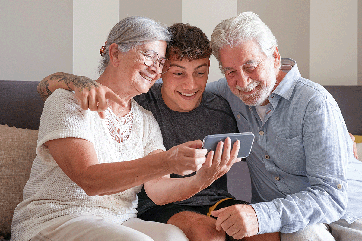 Grandparents Taking a Selfie with Grandson