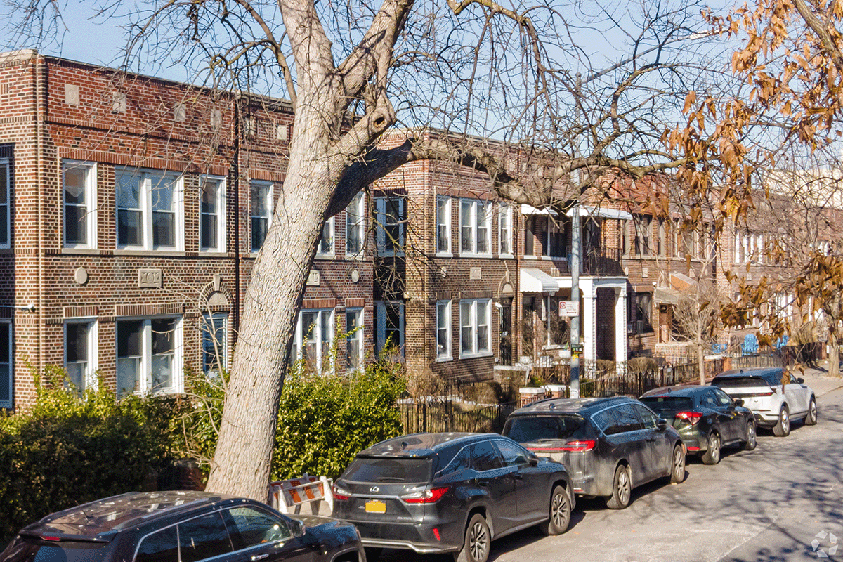 Low-rise brick townhomes in Astoria, Queens.