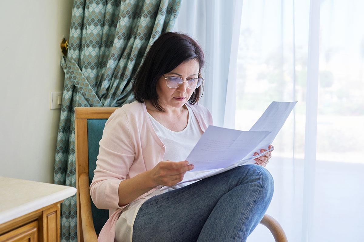 Renter gathering the documents she will need to apply for an apartment.