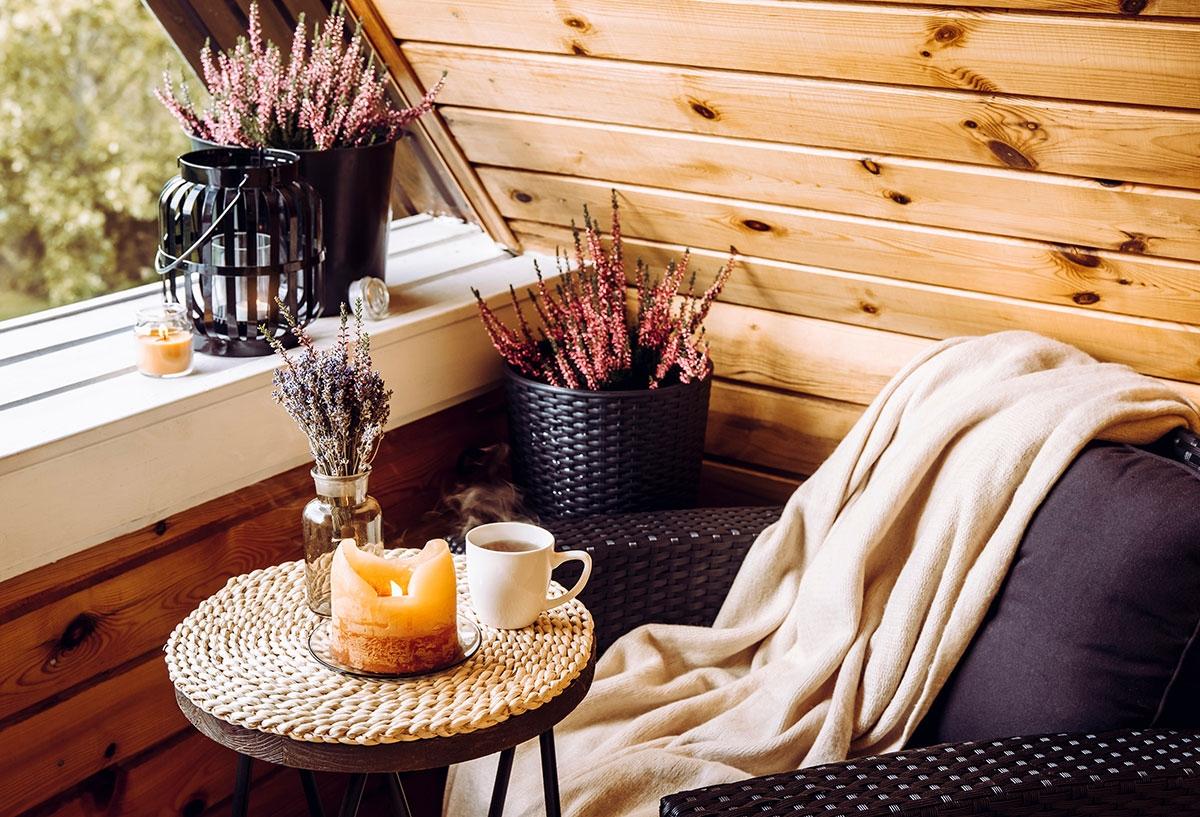 A photo of a balcony decorated for the fall.
