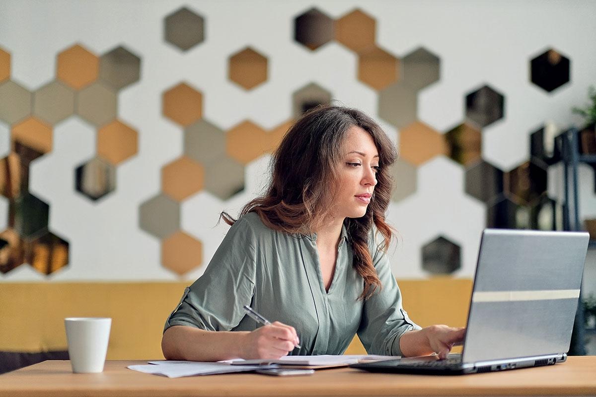 A woman on her laptop.