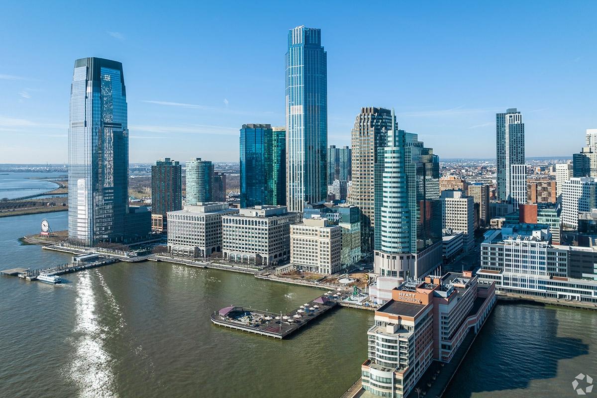High-rise apartment communities and office buildings sit side-by-side on Jersey City's Waterfront.