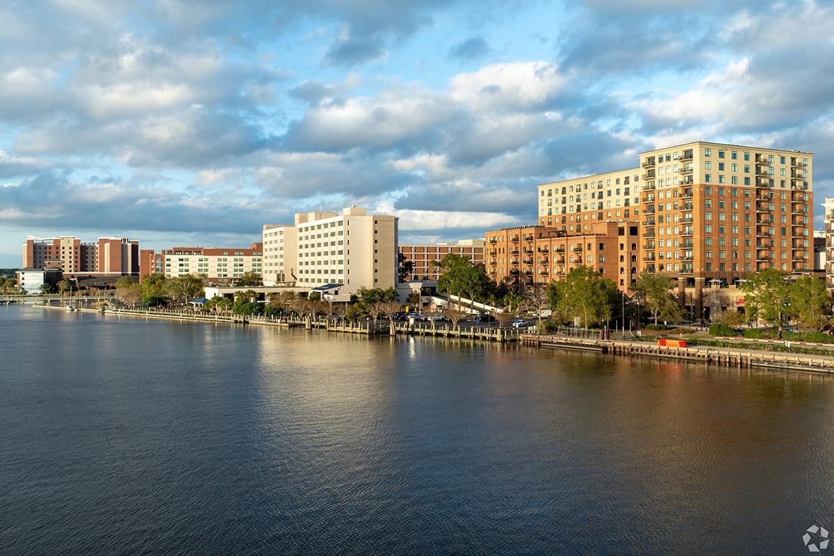 Luxury apartment communities sit next to hotels on the riverfront in Wilmington.