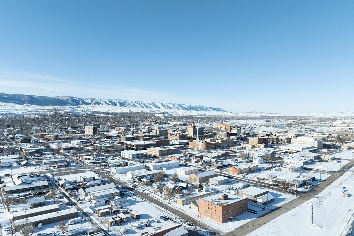 Casper gets covered in snow during the winter, blanketing its buildings.
