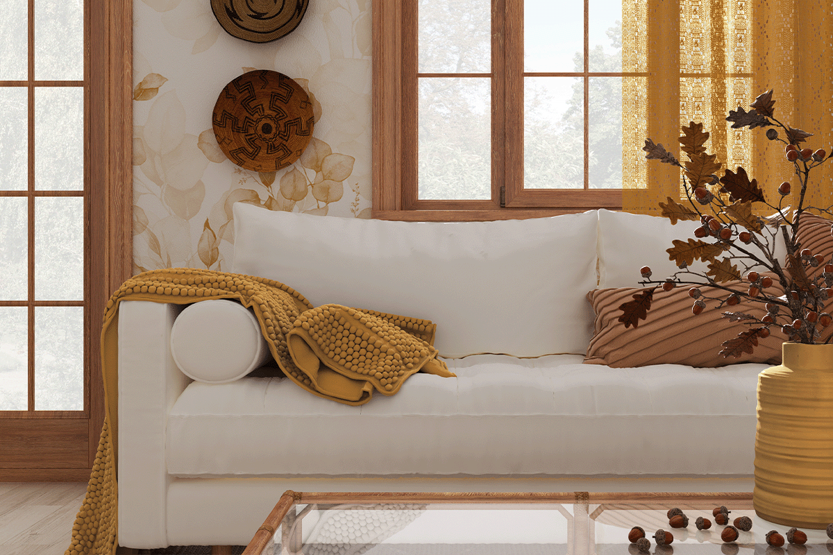 Apartment living room with fall inspired linens and textures