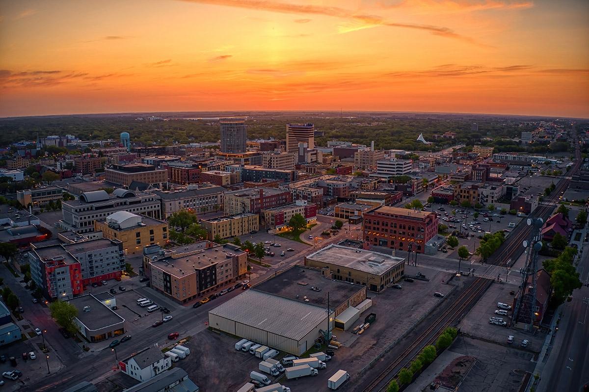 The sun sets over Fargo.