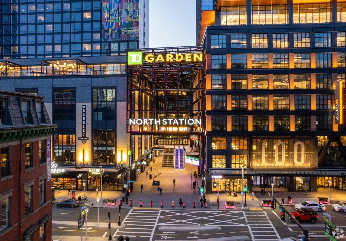 The entrance to TD Garden glows during the evening.