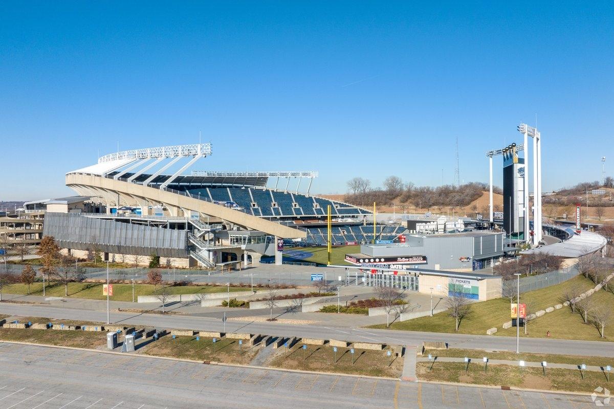 The seats of Kaufmann Stadium rise over the field.