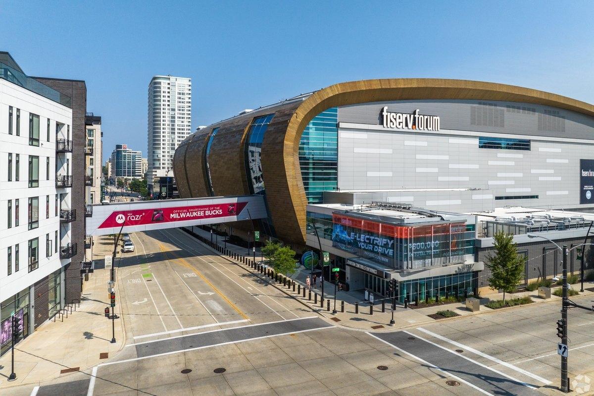 A pedestrian bridge crosses into Fiserv Forum.