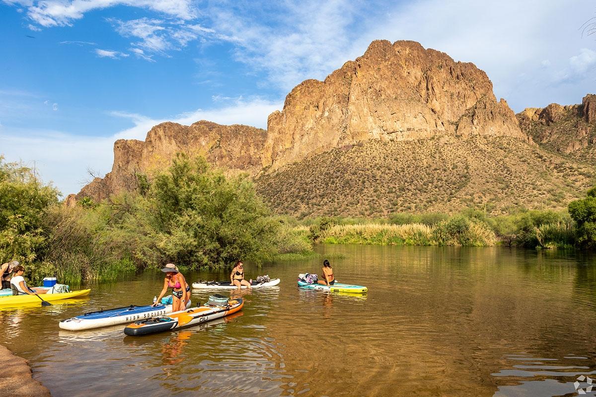 Phoenix residents swimming in nearby river with stunning views.