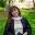 Chloe Savan smiling in graduation pictures.