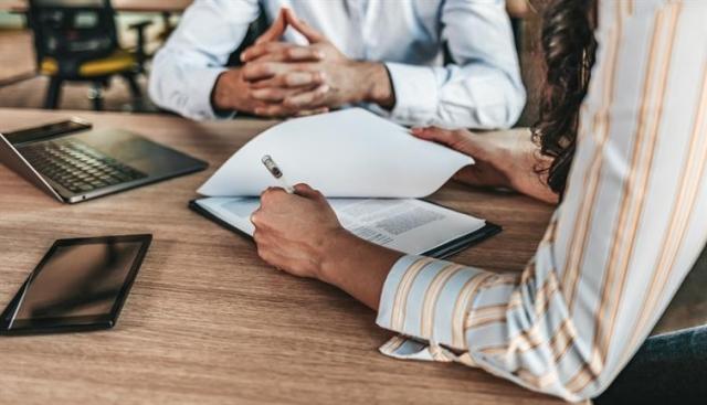 Landlord and tenant negotiating a lease agreement.