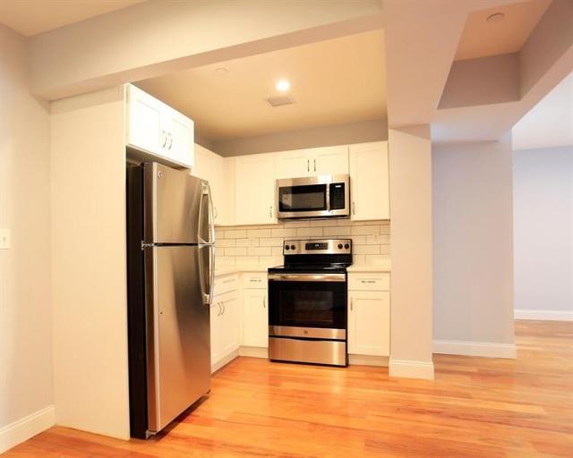 A small kitchen in a model apartment.