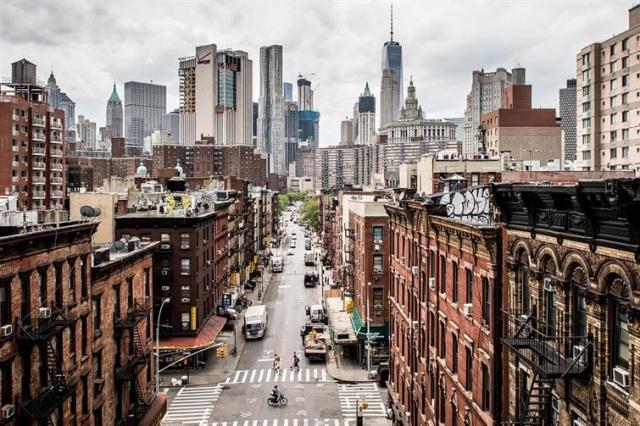 Brownstones framing the New York City skyline
