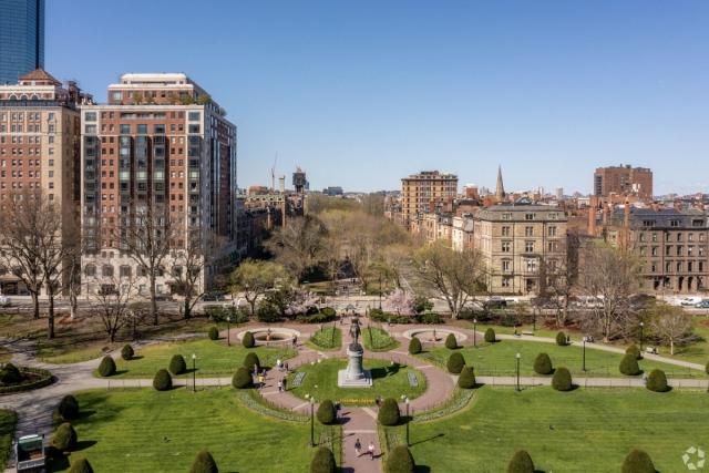 The George Washington statue stands at the Arlington Street entrance to the Boston Common.