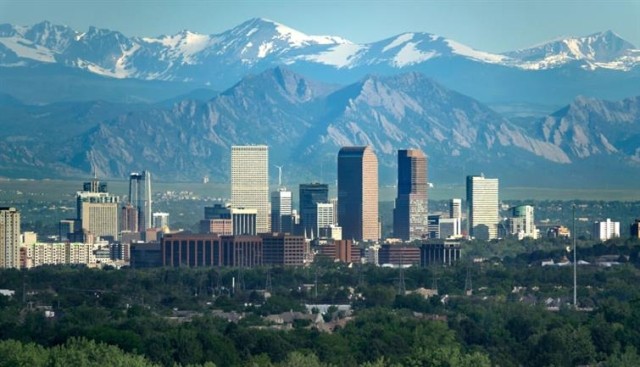 Snow-capped mountains behind the city of Denver, Colorado.