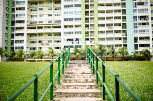 Stairs leading to a large condo community.