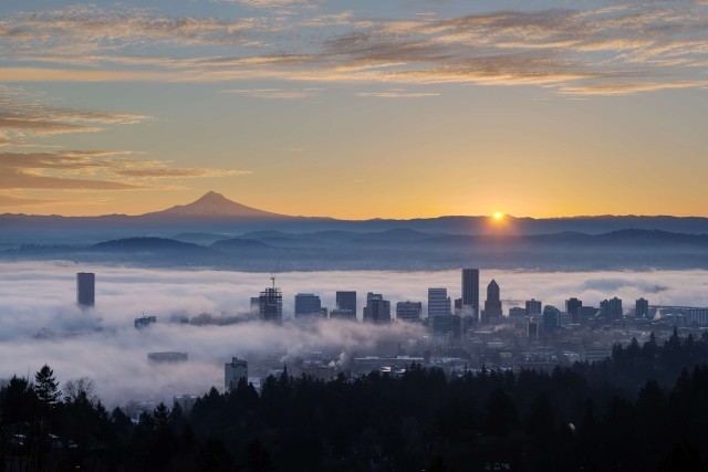 A foggy cityscape of the Portland, Oregon skyline