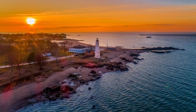 View of the 5-Mile Point Lighthouse at sunset in New Haven, CT.