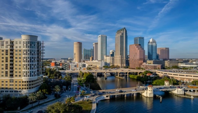 An aerial view of Tampa, Florida, shows the city's skyline over the water.