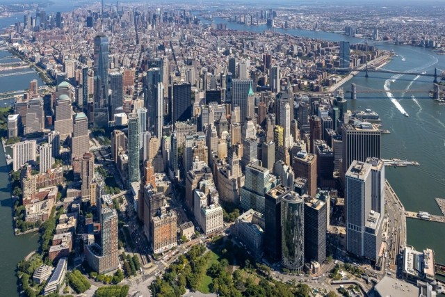 New York City spreads out below as a huge city.