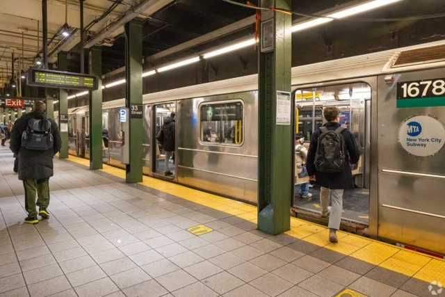 People getting on the subway in New York.