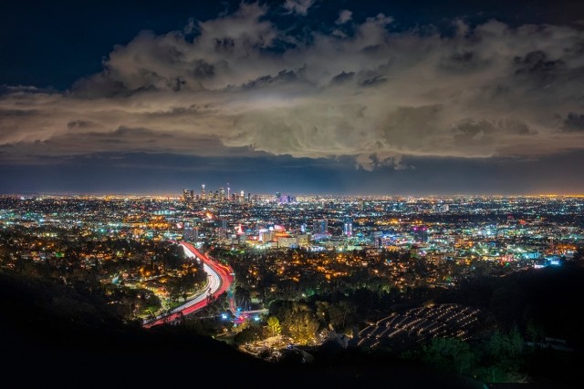 The lights of Los Angeles shine during the night.