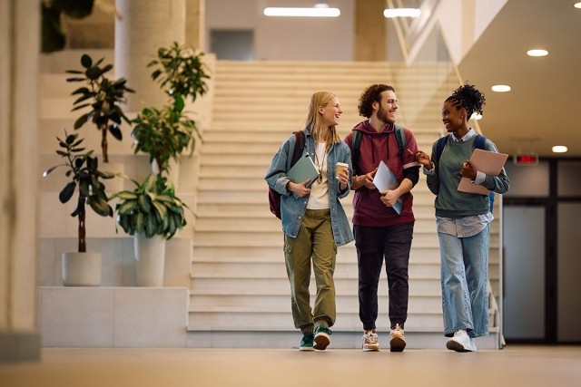 Students walking around their college campus.
