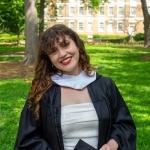 Chloe Savan smiling in graduation pictures.